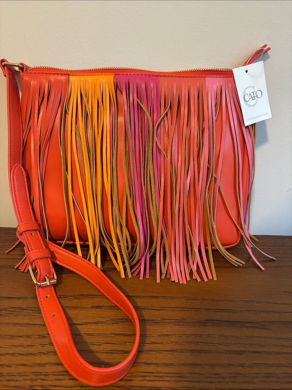 Cato Orange Crossbody Bag with Pink and Yellow Fringe